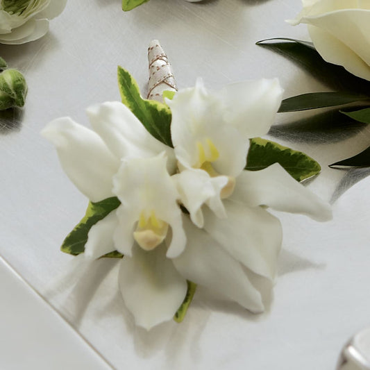 White Mini Cymbidium Boutonniere – FARFANS FLOWERS & DECORATIONS LLC, Frederick MD
